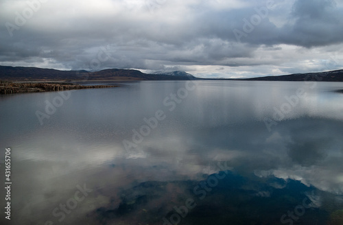 Clouds over the lake, Sylsjøen or Nedalssjøen, Norway, Sweden, with clouds reflected in the water. © Turid Bjørnsen