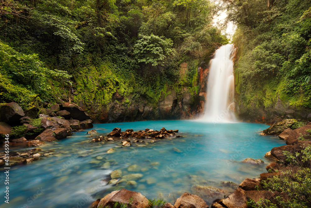 Volcan Tenorio Waterfall in the Jungle in Costa Rica - obrazy, fototapety, plakaty 