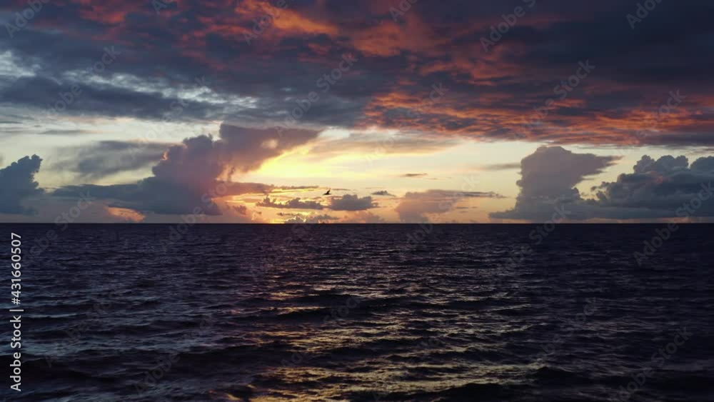 Fast and turbulent sea during a beautiful sunset Fast and turbulent sea during a beautiful sunset