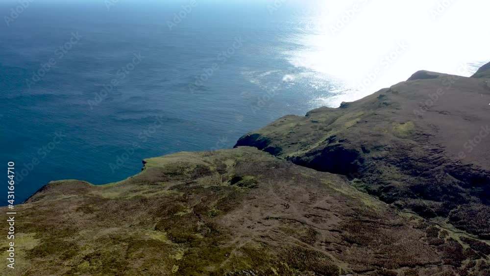Aerial view of the beautiful coast at Malin Beg with Slieve League in the background in County Donegal, Ireland Aerial view of the beautiful coast at Malin Beg with Slieve League in the background in County Donegal, Ireland