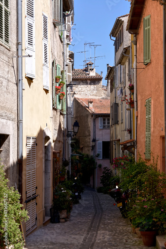 Typical alley in the french village of Biot, commune is a small fortified medieval hilltop village in the Provence-Alpes-Côte d’Azur near Antibes, between Nice and Cannes.