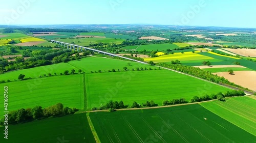 Aerial view of a rail bridge and nearby countryside views in Bauerbach, Germany photo