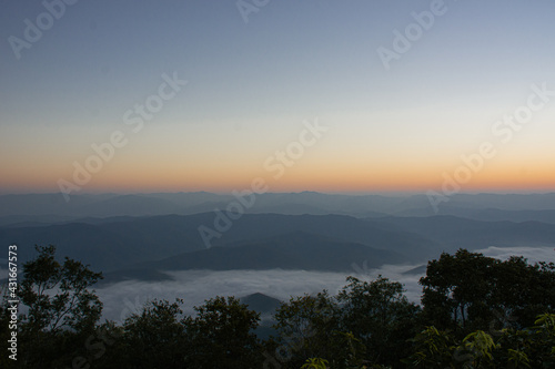Dawn of Sea Fog on the top of the Sierra Early morning at Doi Samer Dao, Nan, thailand