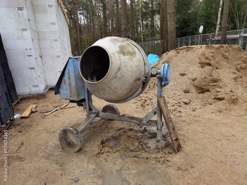 Wallpaper Mural Cement mixer machine at construction site, sand. Torontodigital.ca