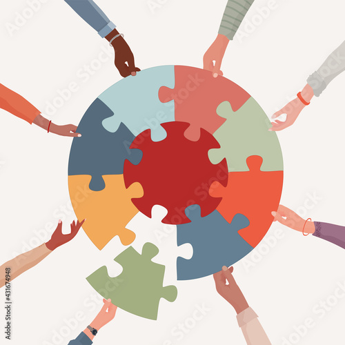 Missing link.Arms of hands of people or co-workers of diverse races holding jigsaw puzzle pieces that connect. Problem solving.Union and teamwork. Collaborating.Strategy.Match. Toy