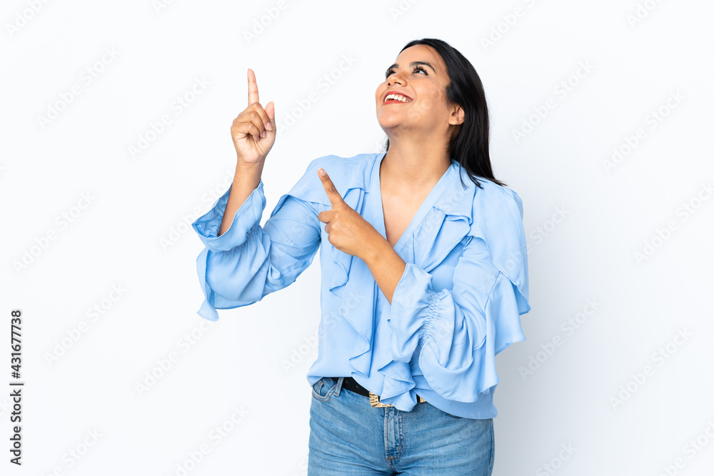 Young latin woman woman isolated on white background pointing with the index finger a great idea Young latin woman woman isolated on white background pointing with the index finger a great idea