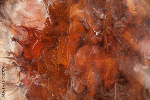 Fluid brown and white art texture. Background with abstract swirling paint effect. Liquid acrylic pattern.