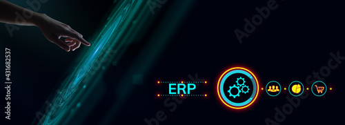 ERP Enterprise Resources planning software system business process automation concept. Hand pressing button on screen