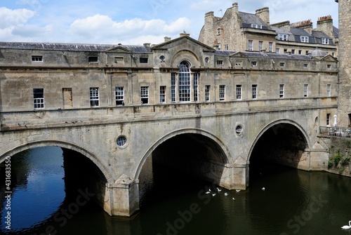 The view of the 18th century Palladian style Pulteney Bridge crossing the River Avon in Bath, England, UK