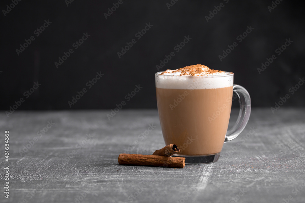 Homemade coffee latte cappuccino in a glass mug on the grey background - obrazy, fototapety, plakaty 