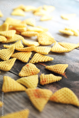 crunchy Indian homemade triangle shape Fryums Papad or chips