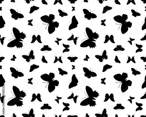 Seamless pattern with black silhouettes of butterflies on white