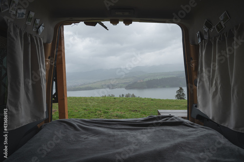 Views from a camper van of the mountains and lakes of Falsztyn poland near the Pieniny nature park. Bed in a camper van, cosy house on wheels.