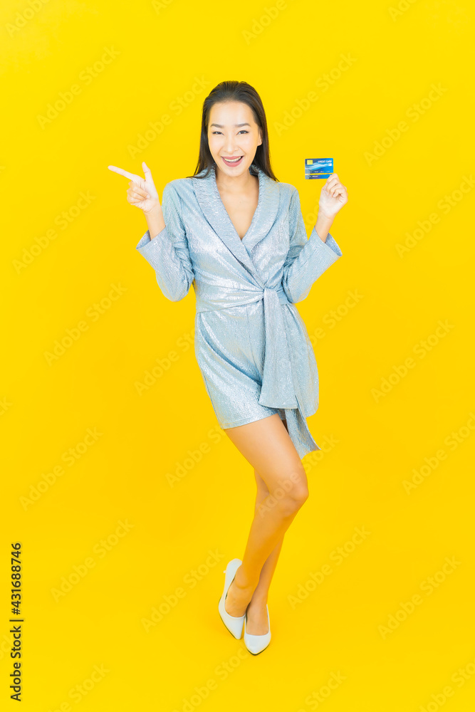 Portrait beautiful young asian woman smile with credit card Portrait beautiful young asian woman smile with credit card