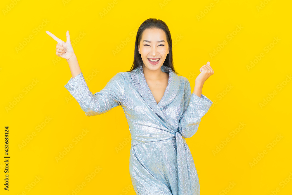 Portrait beautiful young asian woman smile with action Portrait beautiful young asian woman smile with action