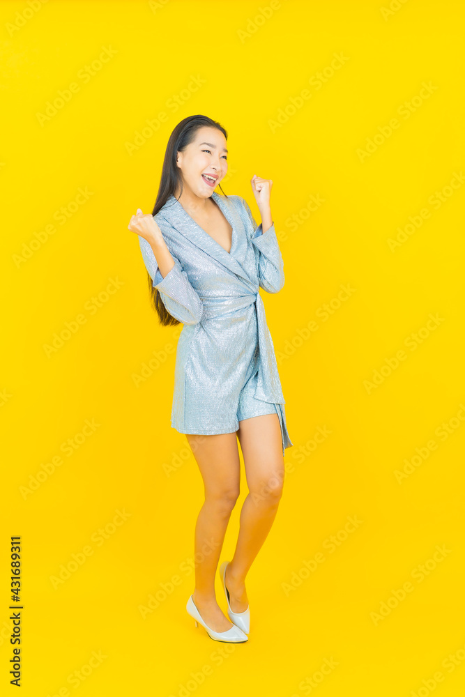 Portrait beautiful young asian woman smile with action Portrait beautiful young asian woman smile with action