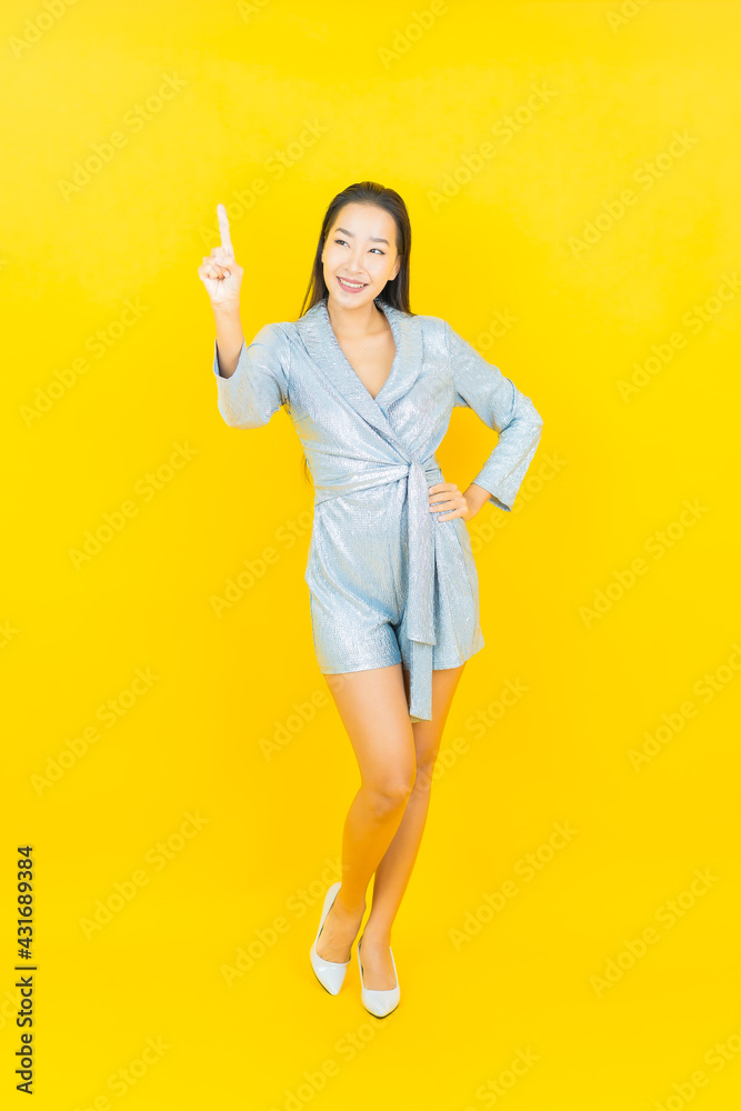 Portrait beautiful young asian woman smile with action Portrait beautiful young asian woman smile with action