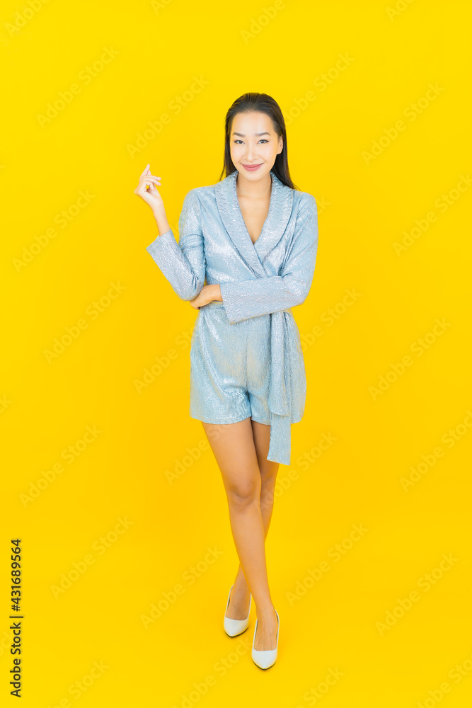 Portrait beautiful young asian woman smile with action Portrait beautiful young asian woman smile with action