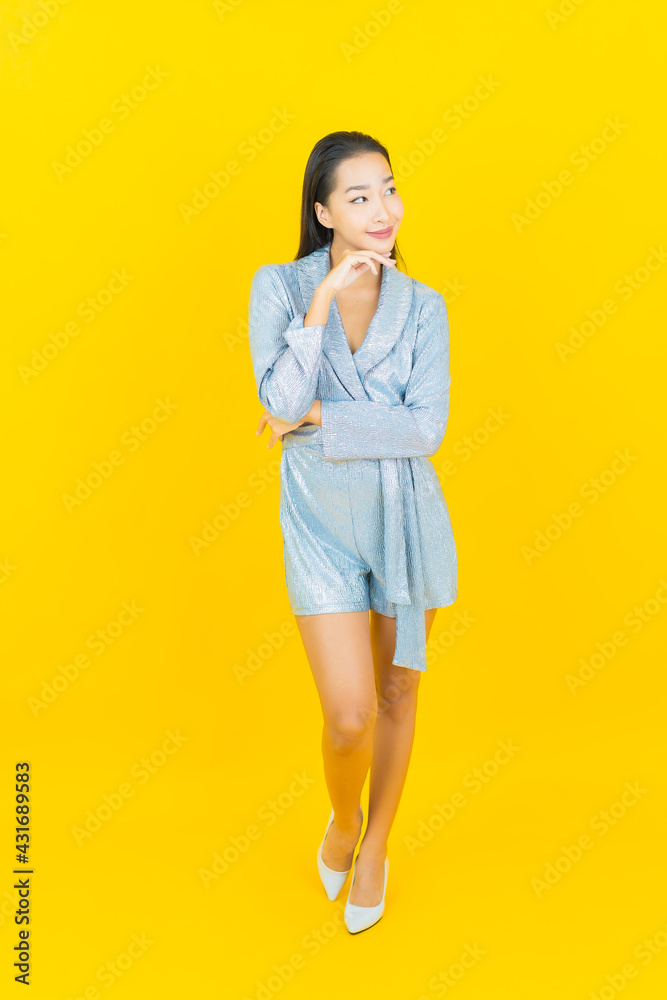Portrait beautiful young asian woman smile with action Portrait beautiful young asian woman smile with action