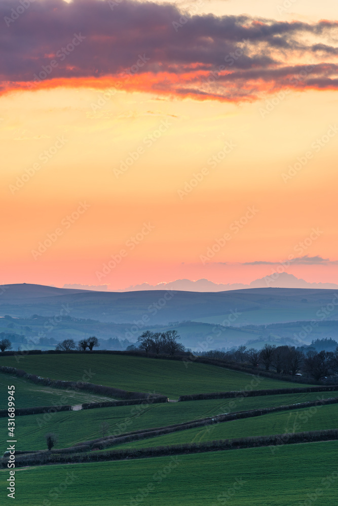 Sunset over Totnes fields, Berry Pomeroy Village, Devon, England, Europe Sunset over Totnes fields, Berry Pomeroy Village, Devon, England, Europe