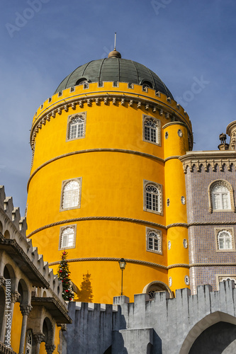 Fragment of Pena National Palace (Palacio Nacional da Pena) - Romanticist palace in Sao Pedro de Penaferrim. Sintra, Portugal. Palace - UNESCO World Heritage Site and one of Seven Wonders of Portugal. photo