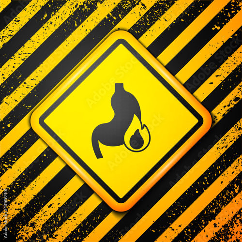 Black Stomach heartburn icon isolated on yellow background. Stomach burn. Gastritis and acid reflux, indigestion and stomach pain problems. Warning sign. Vector