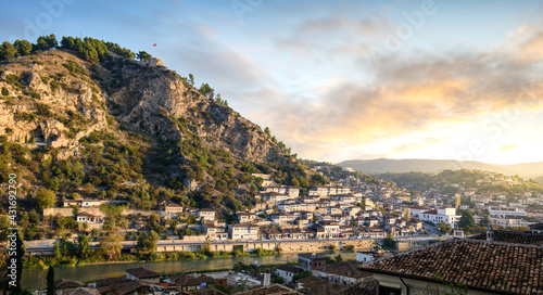 Berat, Albania. Traditional ottoman houses in old town (mangalem district) at sunrise. Listed as UNESCO world heritage site, along with river Osum bank. The city of thousand windows photo