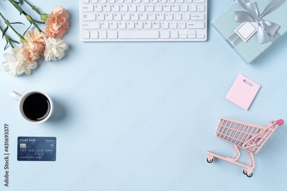 Mother's day buying gift design concept with carnation flower on office table. Mother's day buying gift design concept with carnation flower on office table.