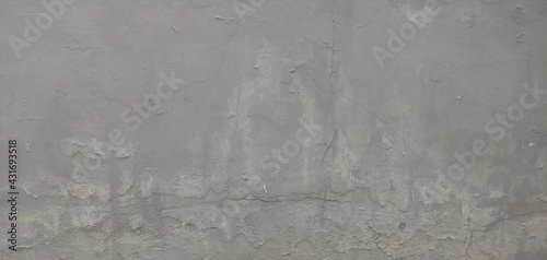 gray painted wall with brush stains