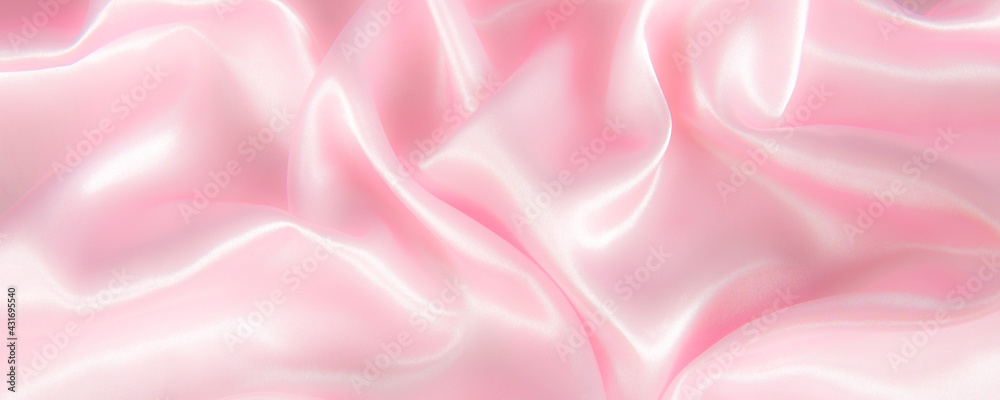 Fototapeta premium Abstract black silk fabric texture background. Cloth soft wave. Creases of satin