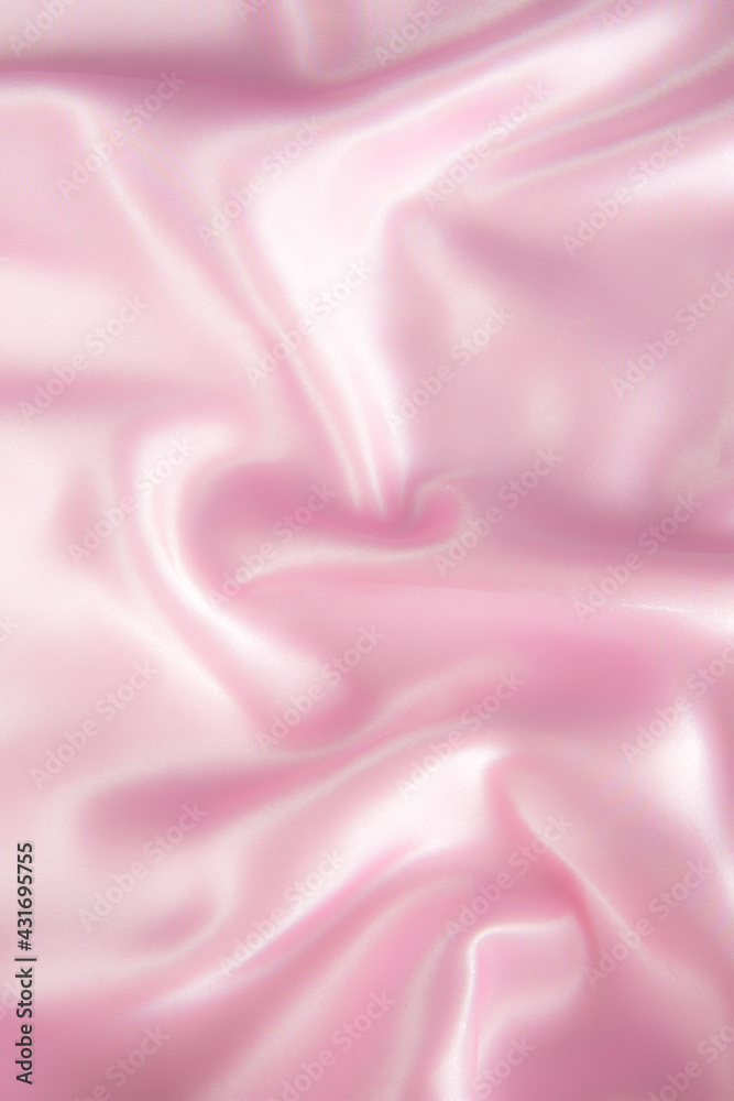 Abstract pink silk fabric texture background. Cloth soft wave. Creases of satin  Stock Photo