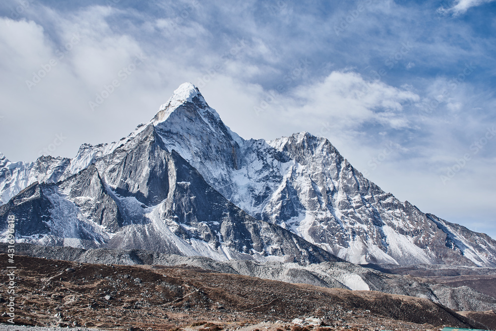 Ama dablam with rising clouds