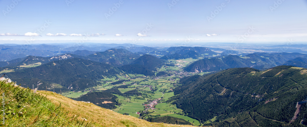 Panorama of alpine mountains in.Puchberg am Schneeberg, Niederösterreich, Austria. Aerial view to the settlement
