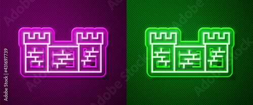 Glowing neon line Great wall of China icon isolated on purple and green background. Vector