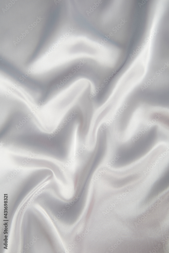Obraz premium Abstract gray silk fabric texture background. Cloth soft wave. Creases of satin