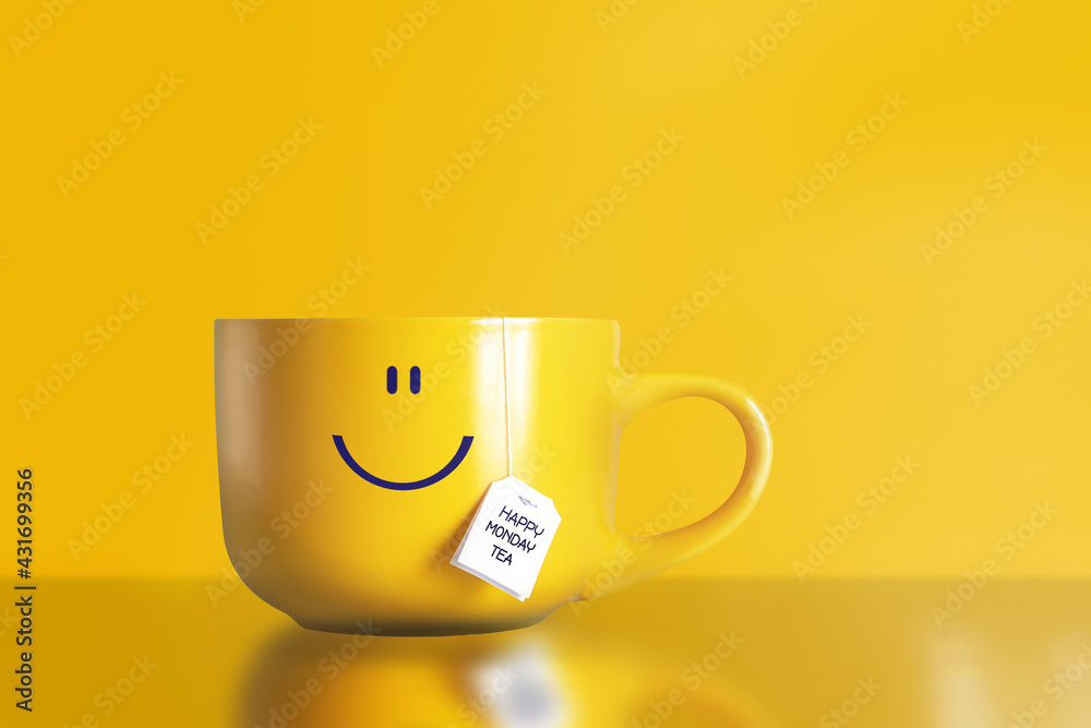 Thank god it's monday happy tea with happy face on big yellow cup on yellow background. The most happiest and motivation day of the year. No blue monday concept. Copy space. Thank god it's monday happy tea with happy face on big yellow cup on yellow background. The most happiest and motivation day of the year. No blue monday concept. Copy space.