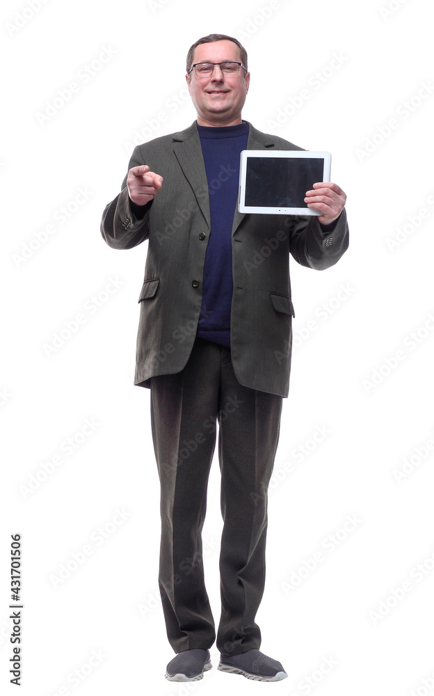 in full growth. Mature man using a digital tablet. in full growth. Mature man using a digital tablet.