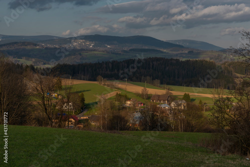 View for Roprachtice village with old church in spring nice sunny evening photo