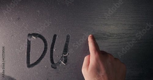 Dust on a table surface with inscription photo