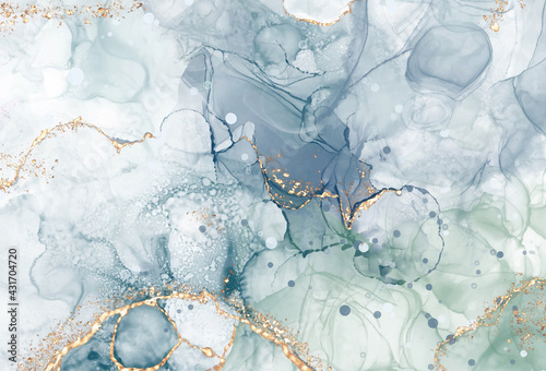 Vector Alcohol ink shape in tender blue and gold.