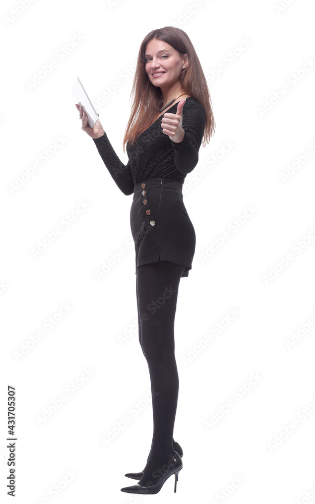 side view. young woman looking at the screen of a digital tablet. side view. young woman looking at the screen of a digital tablet.