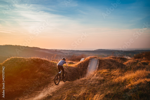 mountain biker on a dusty road