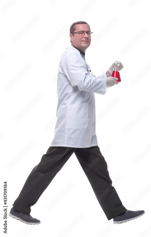 in full growth. confident scientist with a laboratory flask striding forward . in full growth. confident scientist with a laboratory flask striding forward .