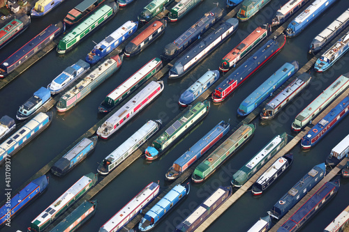 Fotobehang An aerial photograph taken from a helicopter of a large canal narrow boat marina in Britian