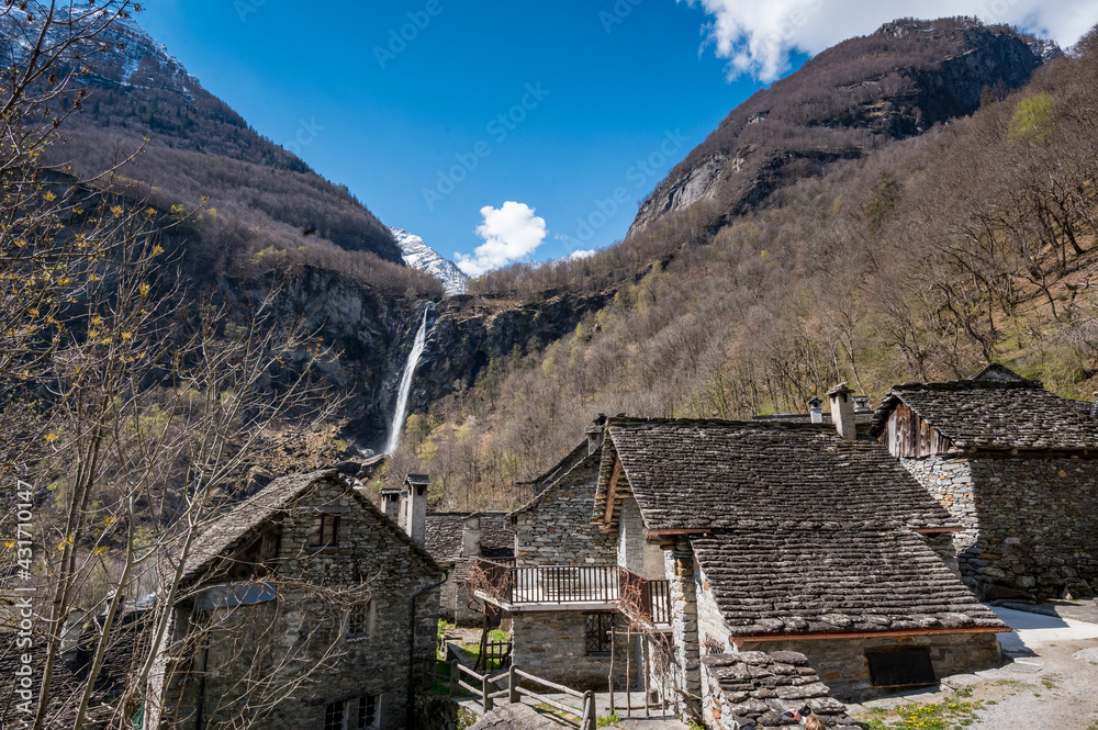 rustico stone houses in Foroglio with Cascata di Foroglio, Ticino rustico stone houses in Foroglio with Cascata di Foroglio, Ticino
