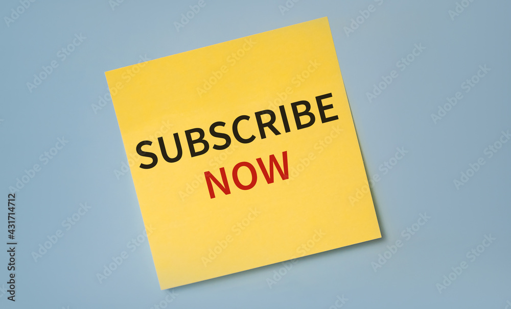 SUBSCRIBE NOW text on a stciker against blue background. SUBSCRIBE NOW text on a stciker against blue background.