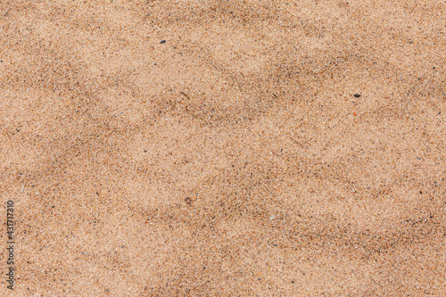 Sand surface at the beach in close up.