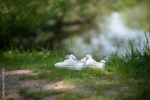 white shoes on grass