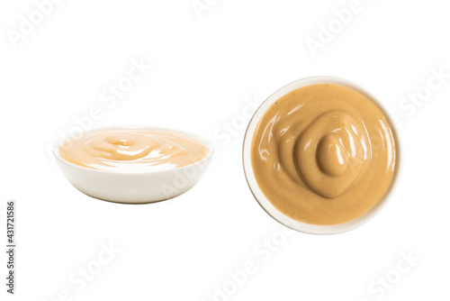 Mushroom sauce in a bowl isolated on white background.