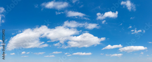 Blue Sky background with tiny Clouds. Panorama background